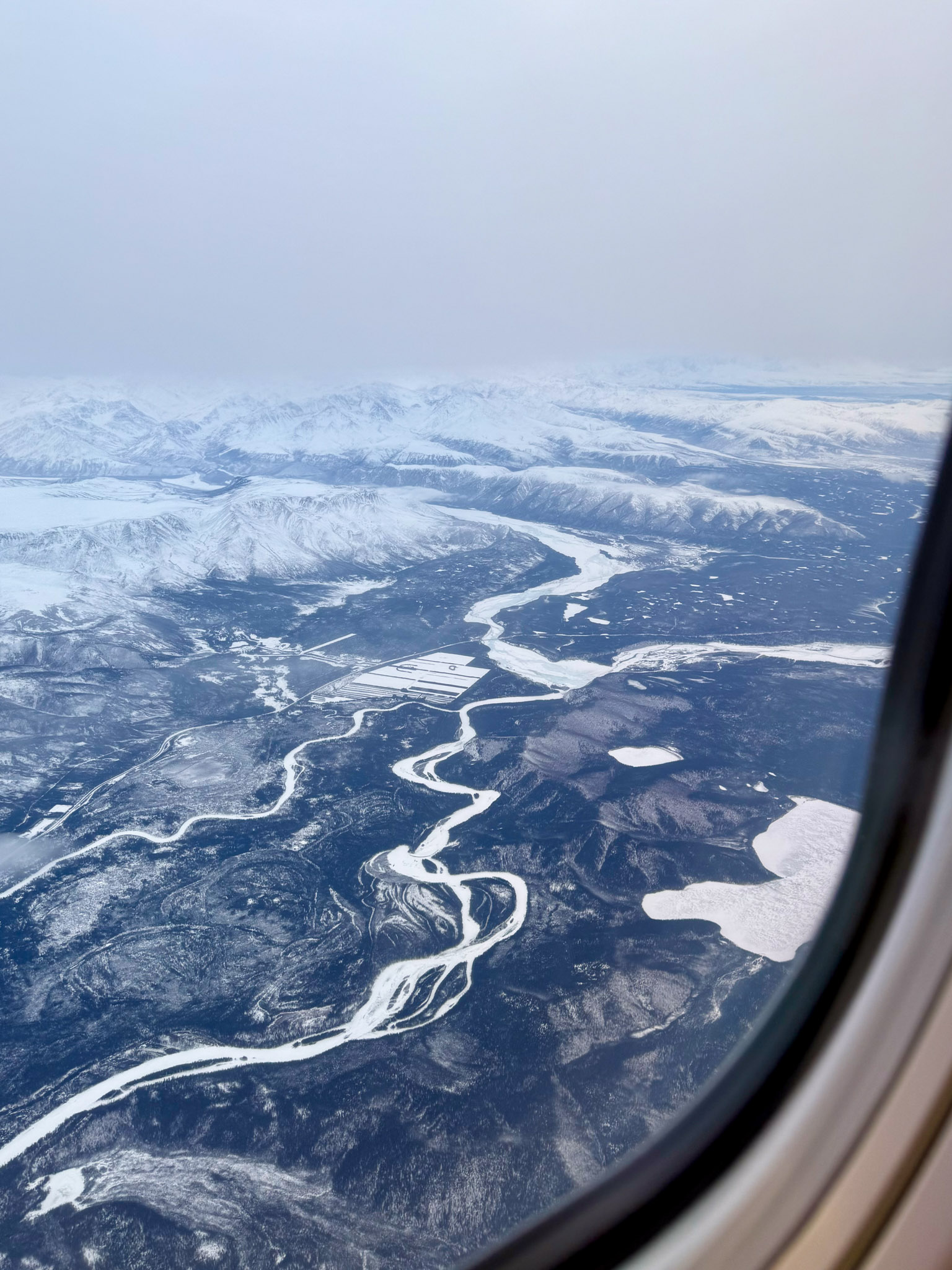 Views Over Planes: Aerial Photos from Airplane Windows